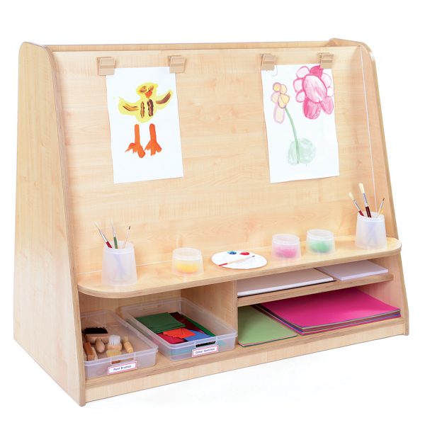 complete art area for art and design with easel and storage trays and pots